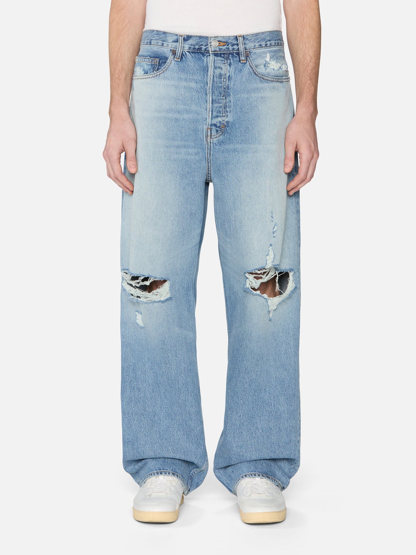 Jeans anchos — Desgaste natural.