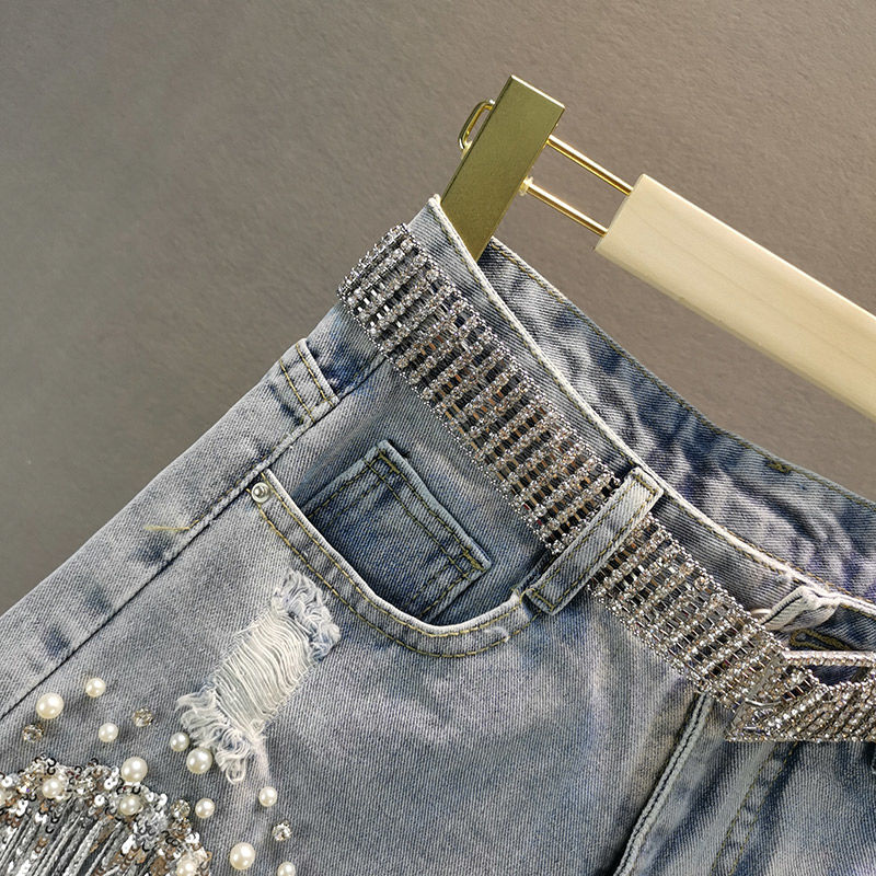 Pantalones cortos vaqueros con flecos Luisa