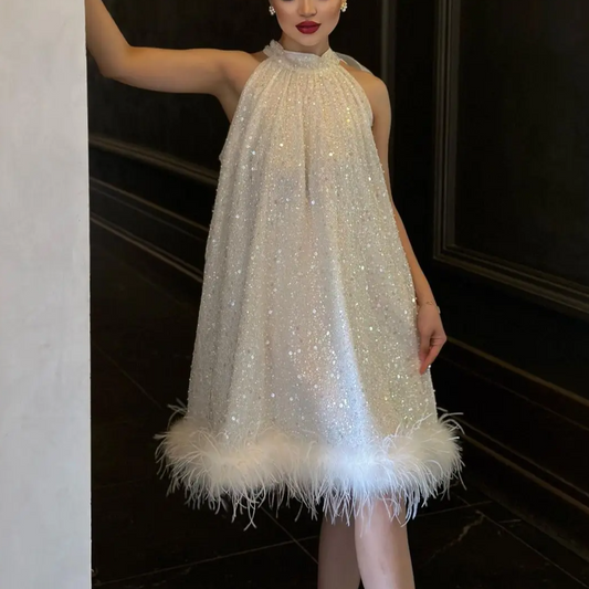 Vestido de plumas con lentejuelas