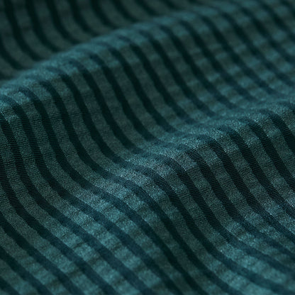 Polo de manga corta Copa – Color bálsamo (verde azulado suave).